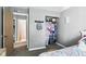Neutral bedroom with a closet and view to the bathroom at 8929 Sunburst Cir, Indianapolis, IN 46227