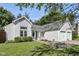 Inviting single-Gathering home with a covered porch, well-maintained landscaping, and a two-car garage at 8929 Sunburst Cir, Indianapolis, IN 46227