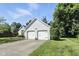 Traditional home with a two-car garage, attractive curb appeal, and a well-kept lawn at 8929 Sunburst Cir, Indianapolis, IN 46227