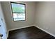 Charming bedroom with new hardwood flooring and natural light at 952 Delray Dr, Indianapolis, IN 46241