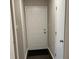 Hallway featuring a neutral color palette and wood flooring at 952 Delray Dr, Indianapolis, IN 46241