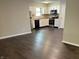 A kitchen featuring stainless steel appliances, wood countertops, and dark hardwood floors at 952 Delray Dr, Indianapolis, IN 46241