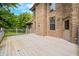 Expansive back deck perfect for outdoor entertaining and relaxation, features brick home and privacy at 1008 Westcreek Dr, Columbus, IN 47201