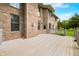 Spacious back deck area with brick home, an ideal setting for outdoor gatherings at 1008 Westcreek Dr, Columbus, IN 47201