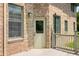 Back door area with brick, offering easy access to the outdoor deck space at 1008 Westcreek Dr, Columbus, IN 47201