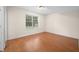 Finished basement with laminate flooring and a window to the outside at 1008 Westcreek Dr, Columbus, IN 47201
