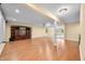 Finished basement with laminate flooring, entertainment center, and carpeted area at 1008 Westcreek Dr, Columbus, IN 47201