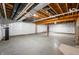 Unfinished basement with concrete floor and exposed ceiling at 1008 Westcreek Dr, Columbus, IN 47201