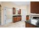 Bathroom featuring double sink vanity, granite countertops, and tiled floors at 1008 Westcreek Dr, Columbus, IN 47201