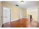 Open hallway with hardwood flooring and natural light with an iron railing at 1008 Westcreek Dr, Columbus, IN 47201