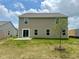 Spacious backyard with a lush lawn and a patio, perfect for outdoor entertaining at 10144 Camp Creek Way, Indianapolis, IN 46229