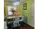 Cozy dining area with a marble table and comfortable seating, perfect for Gathering meals at 10210 E 33Rd St, Indianapolis, IN 46235