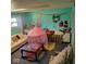 Cozy room with two windows and neutral-toned furniture at 10210 E 33Rd St, Indianapolis, IN 46235