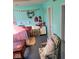 Cozy room with two windows and neutral-toned furniture at 10210 E 33Rd St, Indianapolis, IN 46235