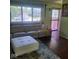 Bright living room with a fireplace, comfortable seating, and stylish decor at 10210 E 33Rd St, Indianapolis, IN 46235