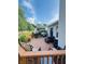 Spacious back deck featuring seating, dining area and stainless steel grill, perfect for entertaining outdoors at 10477 Silver Ridge Cir, Fishers, IN 46038