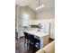 Beautiful eat-in kitchen with an island, quartz counters, lots of natural light, and stainless appliances at 10477 Silver Ridge Cir, Fishers, IN 46038