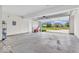 Two-car garage featuring an open garage door with exterior view of the neighborhood at 1139 Fernwood Way, Plainfield, IN 46168