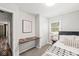 Well-lit bedroom featuring a built-in desk area and neutral tones at 1205 Park Dr, Lebanon, IN 46052