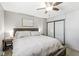 Serene bedroom with a ceiling fan and a sliding door closet at 1205 Park Dr, Lebanon, IN 46052