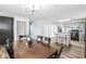 Open kitchen and dining area with a breakfast bar and stainless steel appliances at 1205 Park Dr, Lebanon, IN 46052