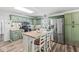 Well-lit kitchen features stainless steel appliances, butcher block counters, and an island at 1205 Park Dr, Lebanon, IN 46052