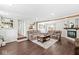 Living room featuring neutral paint, hardwood floors, a fireplace and comfortable seating at 1205 Park Dr, Lebanon, IN 46052