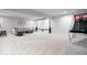 Finished basement featuring home theater, projector screen, bar stools and carpet floors at 12078 Black Mill Pass, Fishers, IN 46040