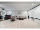 Finished basement features projector screen, bar, kitchenette and carpet floors at 12078 Black Mill Pass, Fishers, IN 46040