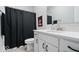 Cozy bathroom featuring a shower with black curtain, white vanity and sleek mirror at 12078 Black Mill Pass, Fishers, IN 46040