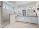 Bright bathroom with double vanity, modern fixtures, and a glass enclosed shower at 12078 Black Mill Pass, Fishers, IN 46040