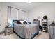 Cozy bedroom with neutral tones, comfortable bed, and modern furniture at 12078 Black Mill Pass, Fishers, IN 46040
