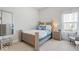 Charming bedroom with carpet floors, lots of natural light and modern decor at 12078 Black Mill Pass, Fishers, IN 46040