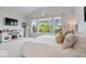 Spacious main bedroom with large windows, comfortable decor, and lots of natural light at 12078 Black Mill Pass, Fishers, IN 46040