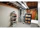 Unfinished basement area with exposed ceiling, HVAC system, and storage shelving at 13020 Lombard Ct, Fishers, IN 46038