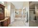 Bright bathroom featuring vanity, toilet, tub and shower with glass door at 13020 Lombard Ct, Fishers, IN 46038