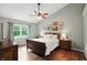 Spacious bedroom with a vaulted ceiling, ceiling fan, and lots of natural light at 13020 Lombard Ct, Fishers, IN 46038