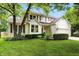 Charming two-story home with a well-manicured lawn and attached two-car garage, creating a welcoming curb appeal at 13020 Lombard Ct, Fishers, IN 46038