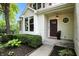 Inviting front porch with decorative landscaping, providing a warm and welcoming entrance to the home at 13020 Lombard Ct, Fishers, IN 46038