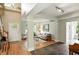 Bright and open living room with hardwood floors and a welcoming atmosphere for relaxation and gatherings at 13020 Lombard Ct, Fishers, IN 46038