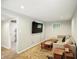 Basement living room showcasing a cozy area for relaxation and entertainment at 13020 Lombard Ct, Fishers, IN 46038