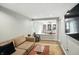 Inviting living room showcasing seamless flow to the recreation room at 13020 Lombard Ct, Fishers, IN 46038