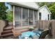 Cozy patio with lounge chairs, a blue patterned rug, and a view of the backyard at 13020 Lombard Ct, Fishers, IN 46038