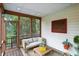 Relaxing screened-in porch with comfortable seating and outdoor views at 13020 Lombard Ct, Fishers, IN 46038