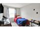 Modest bedroom with neutral walls and a small window, suitable for a single occupant at 1305 Gumwood Dr, Indianapolis, IN 46234