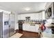 Functional kitchen featuring white cabinetry and stainless steel appliances at 1305 Gumwood Dr, Indianapolis, IN 46234