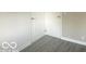 Bedroom with a view of bright doorways and modern flooring at 1306 Woodbine Dr, Anderson, IN 46011