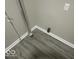 Corner of the room featuring vinyl flooring and piping at 1306 Woodbine Dr, Anderson, IN 46011