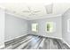 Spacious bedroom with neutral paint, vinyl flooring, and ceiling fan at 1325 Fordice Rd, Lebanon, IN 46052