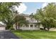 Charming two-story home with mature trees and a well-manicured lawn offering great curb appeal at 1325 Fordice Rd, Lebanon, IN 46052